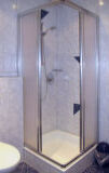 a clear glass shower door